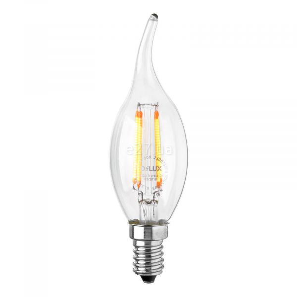 Лампа світлодіодна Delux 90011685 потужністю 4W з серії Filament. Типорозмір — BL37B з цоколем E14, температура кольору — 2700K